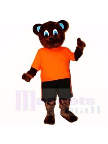 Sport-Braunbär mit orange Hemd-Maskottchen kostümiert Karikatur